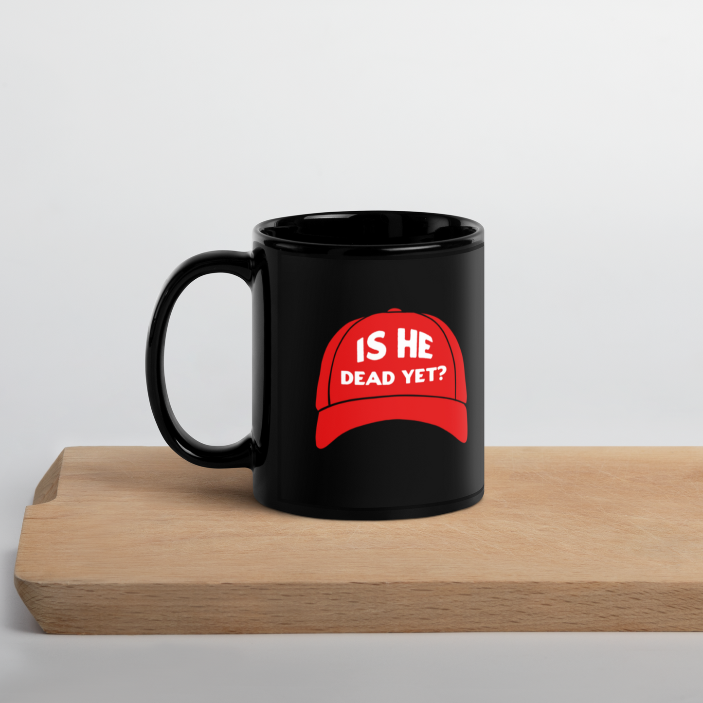 Is He Dead Yet? Black Mug