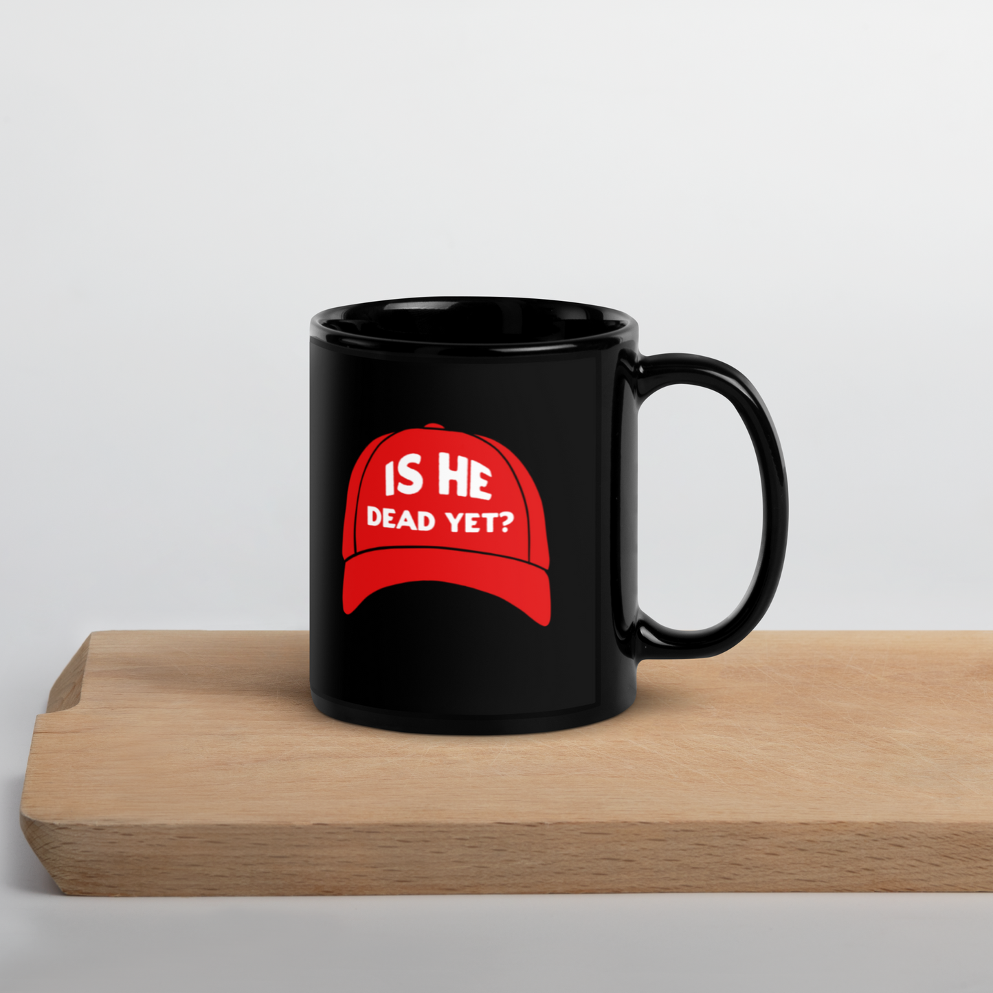 Is He Dead Yet? Black Mug